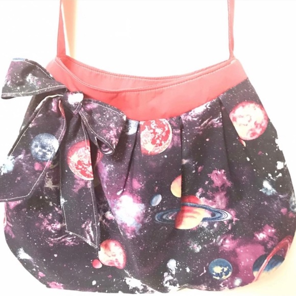 Galaxy Gift Set!
Pink galaxy crossbody purse
Deep space galaxy charm bracelet - Picture 2 of 5